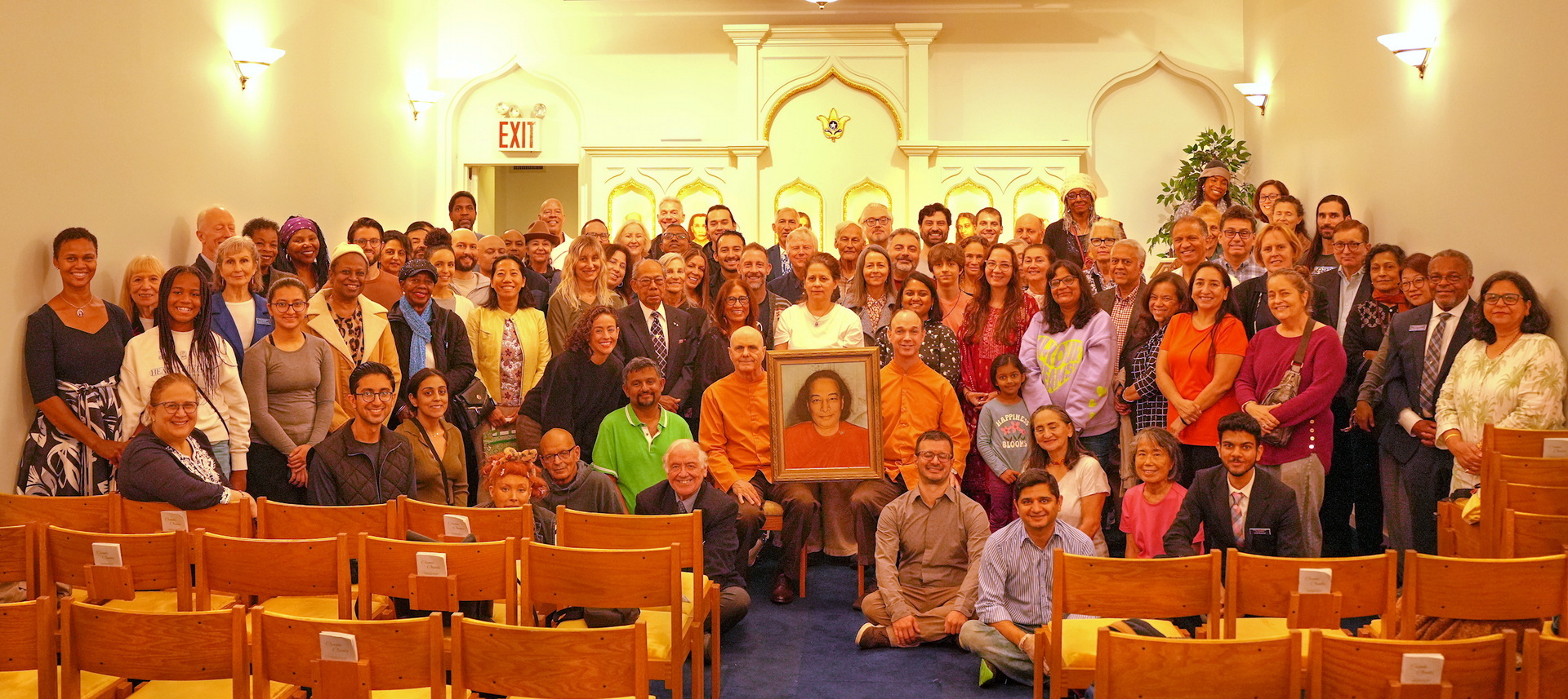 In September and October, Brother Devananda and Brother Bhimananda visited four cities in the U.S., and are shown here with SRF members in New York City.