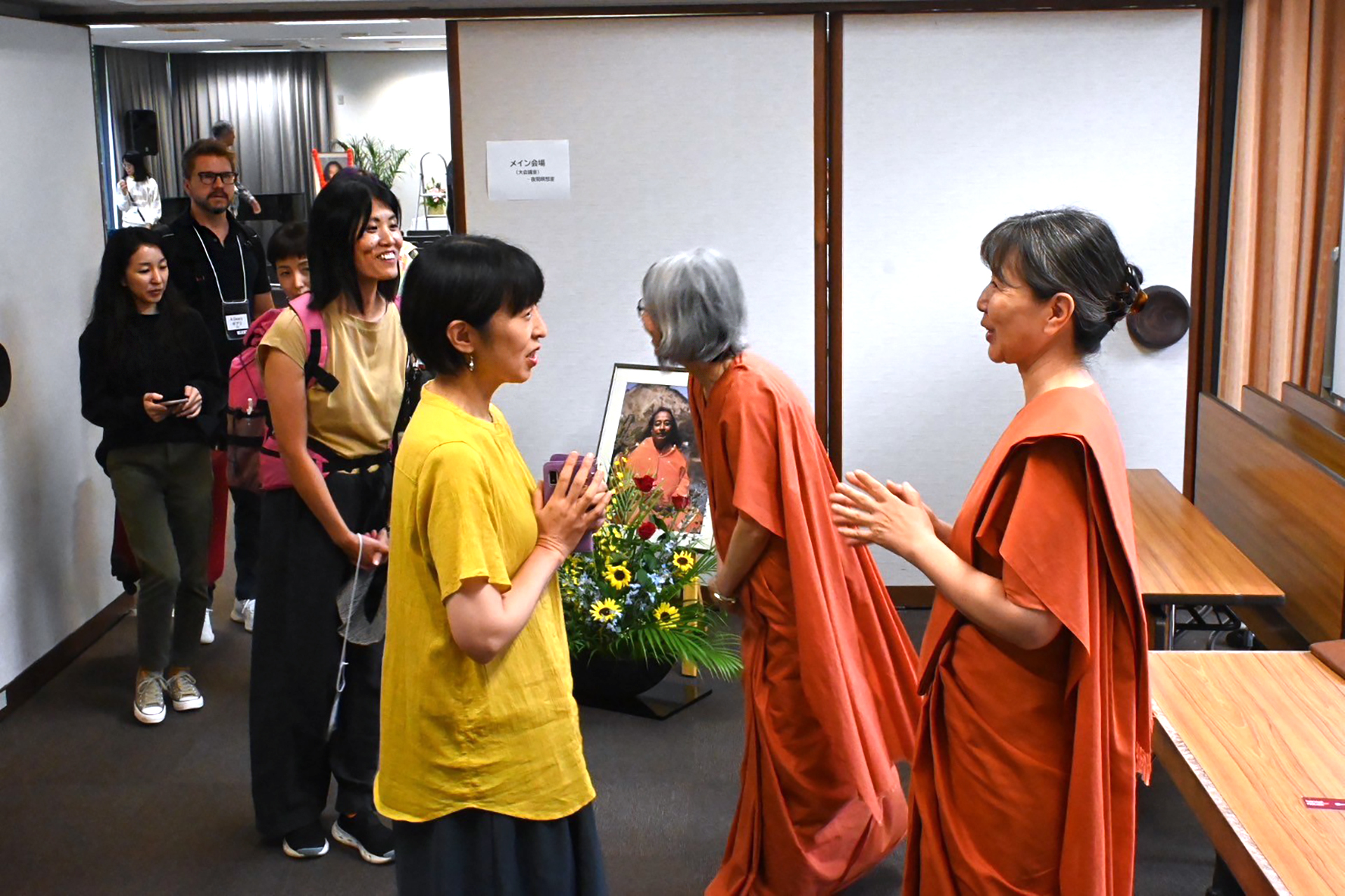 Sister Radhika (left) and Sister Shankari greet members in Kyoto.