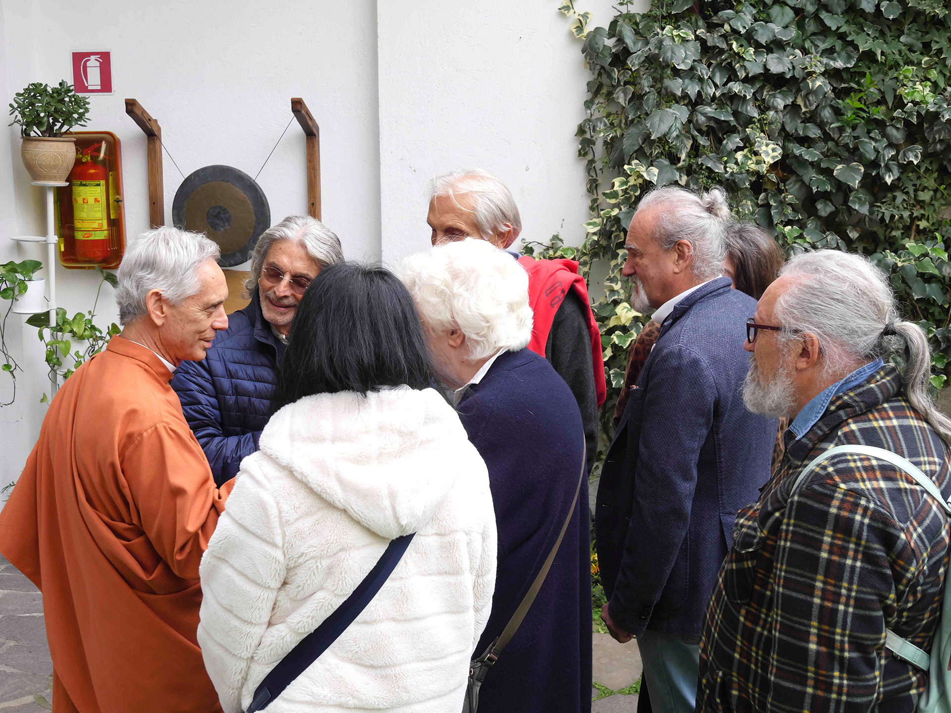 Brother Sevananda speaks with Milano members.