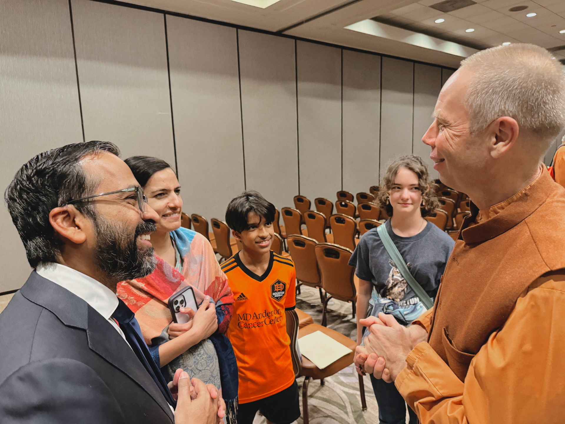 Brother Vidurananda greets attendees after the public lecture.