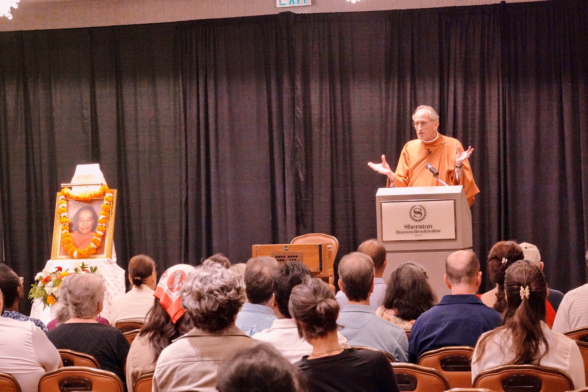 Brother Bhumananda gives a public lecture to a receptive audience in Houston.