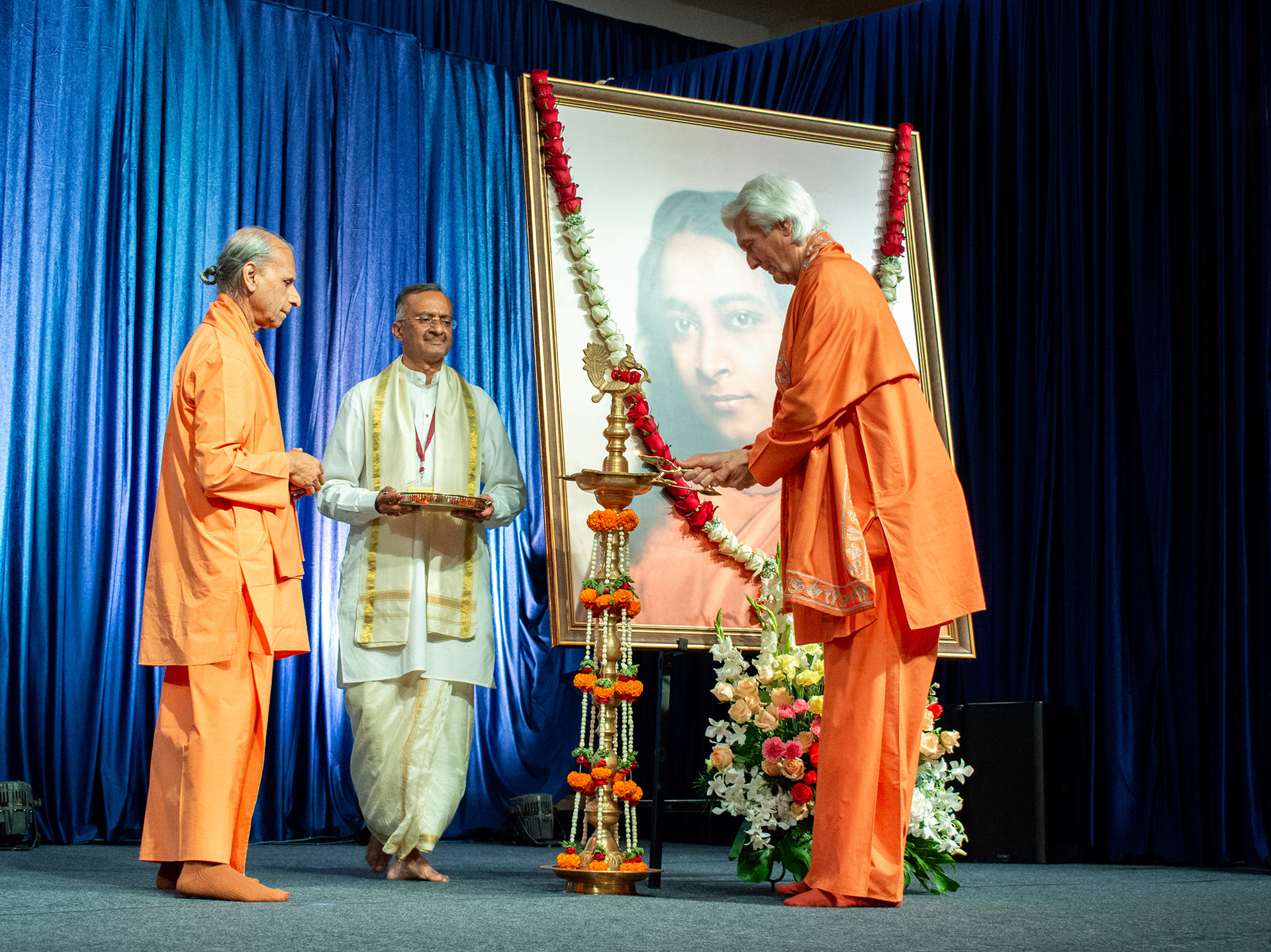 The all-day program began with Brother Chidananda lighting a ceremonial lamp.