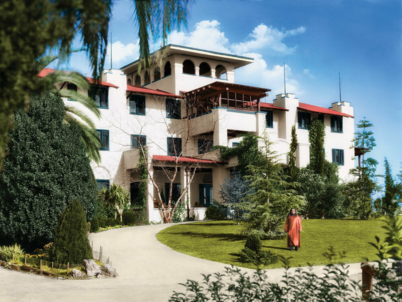 Paramahansa Yogananda standing in front of Mother Center