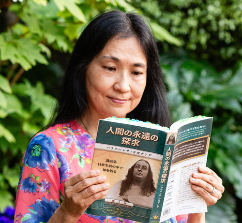 Devotee reading MEQ square