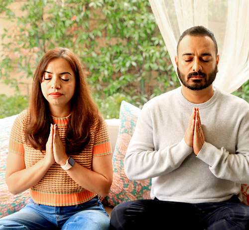 SRF Devotee Couple praying